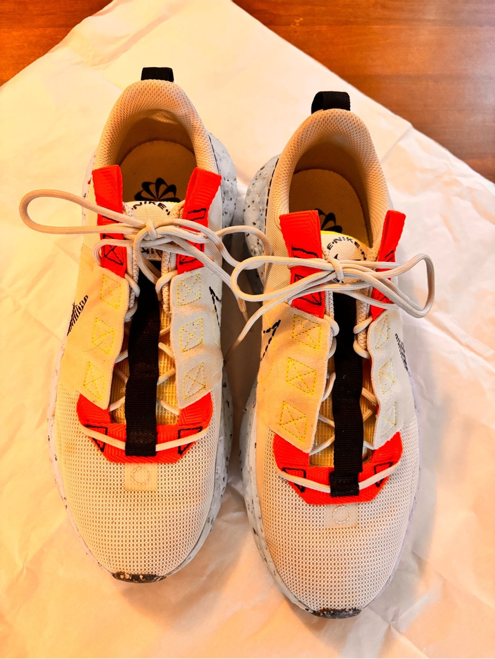 Nike Women’s White Sneakers with Red and Black Accents
